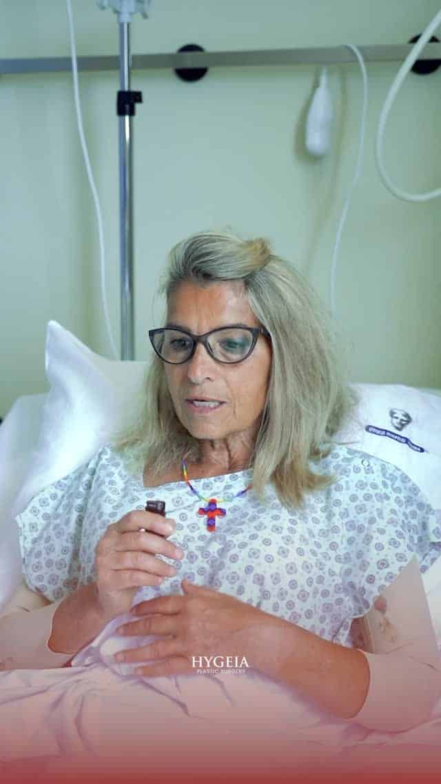 Patient in hospital bed after plastic surgery at Hygeia Hospital in Albania.